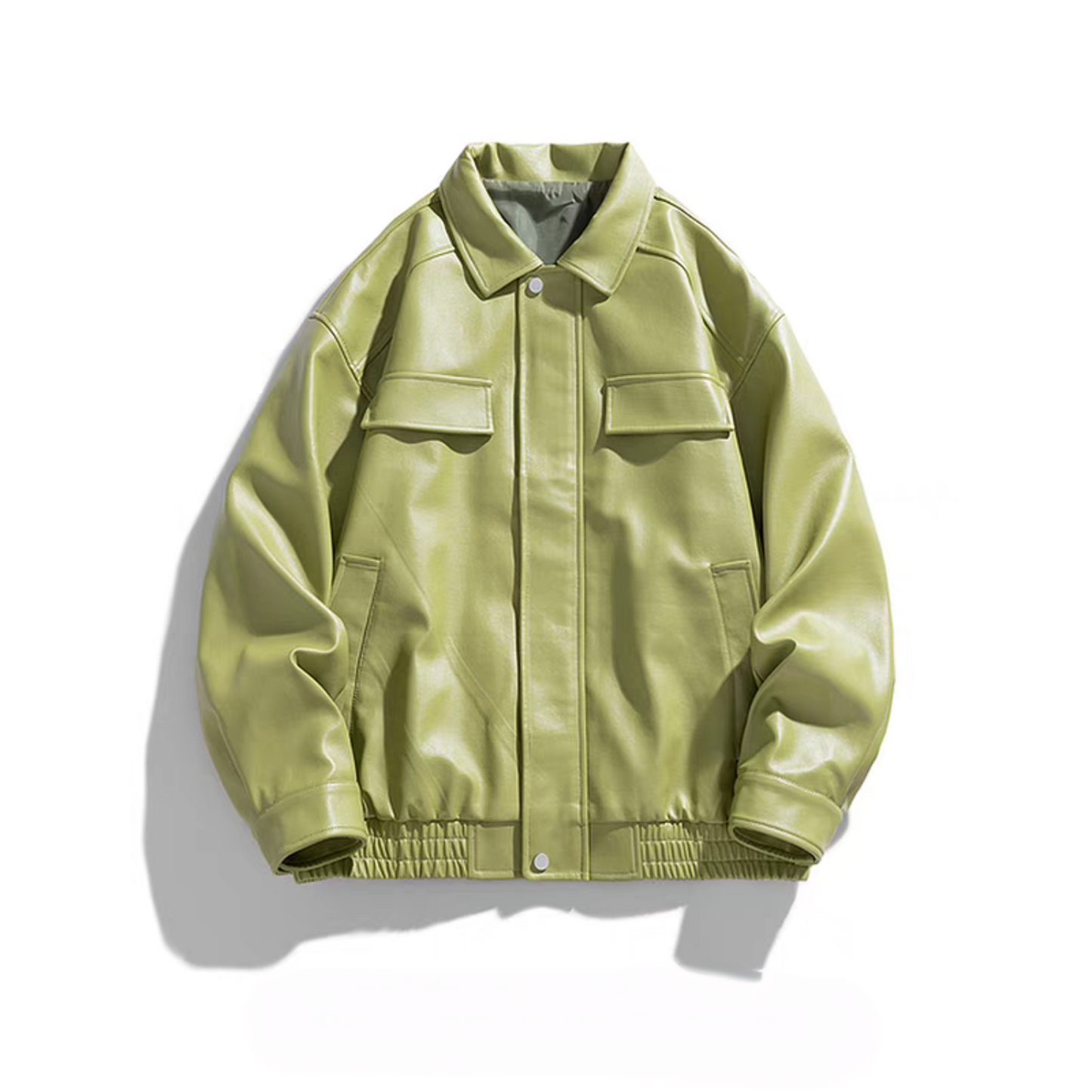 Green PU leather jacket with flap chest pockets, elastic hem and snap buttons, product front view on white background