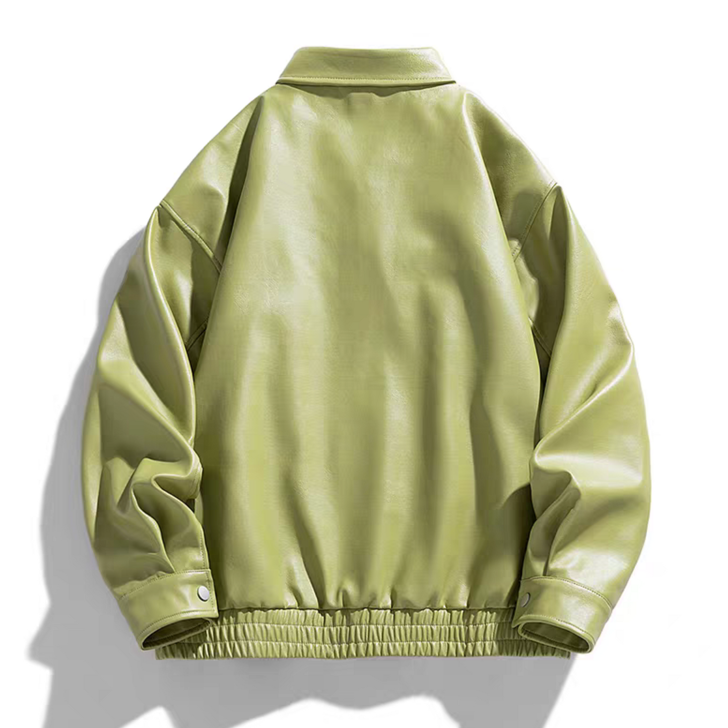 Flat lay back view of light green faux leather varsity jacket with elastic hem and button cuffs on white background