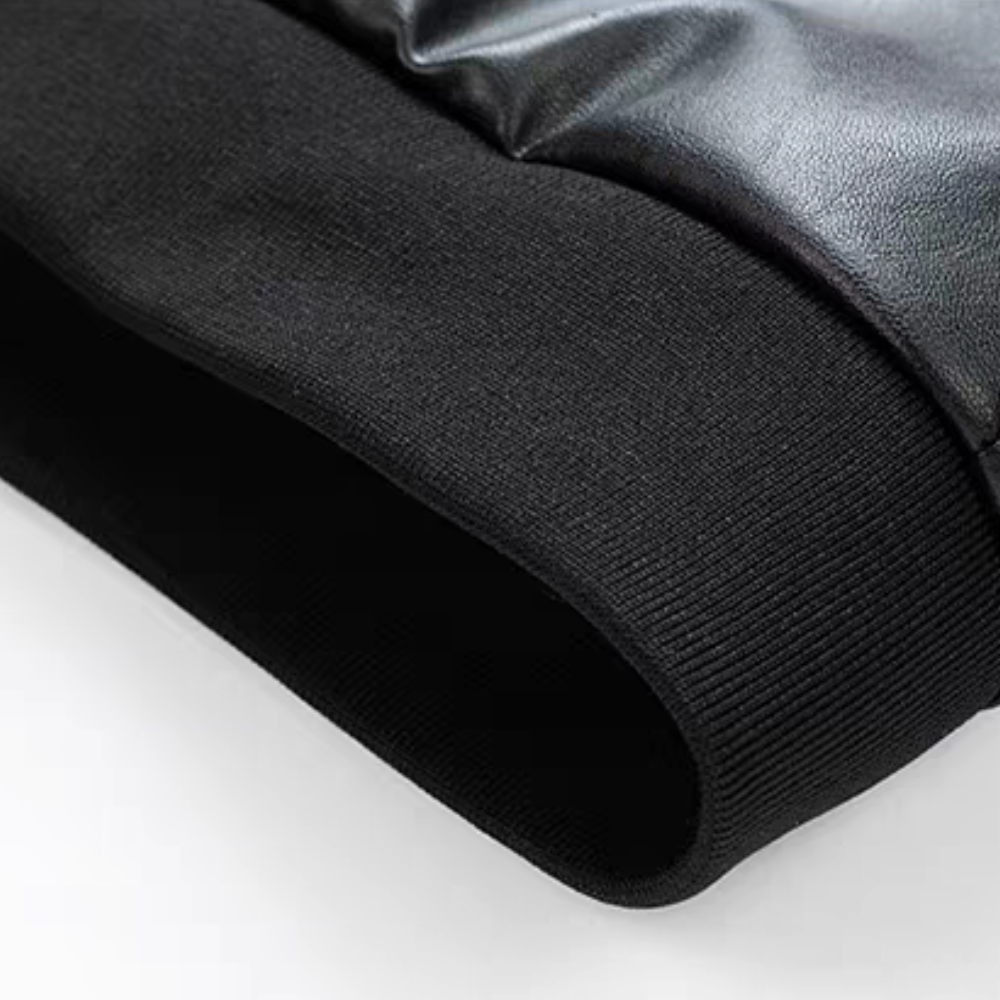 Close-up of black ribbed cuff on faux leather moto racing jacket for men