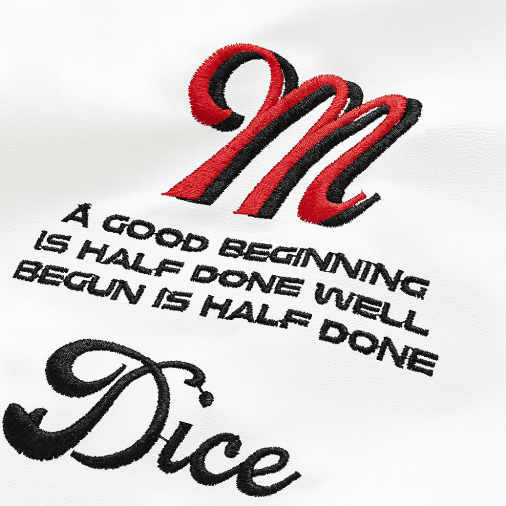 Close-up of red and black embroidered Dice logo and quote ''A good beginning is half done'' on white PU racing jacket
