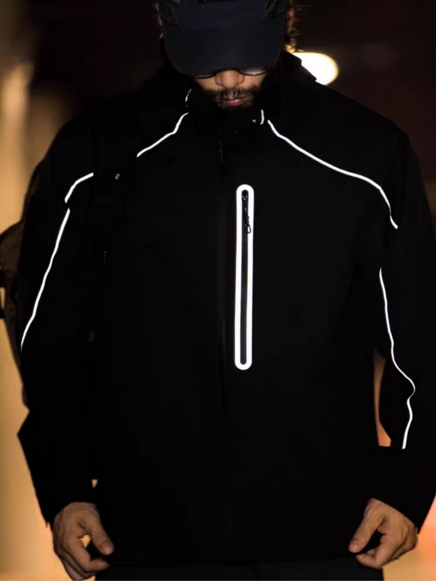 Model wearing STVLE lightsaber reflective techwear jacket, front view showing glowing reflective lines on sleeves and chest zipper